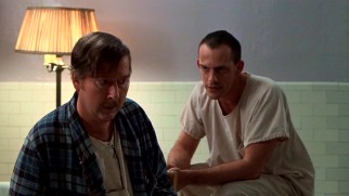 Taber (Christopher Lloyd) is quick to pounce on Harding (William Redfield) for the way he contributes to group therapy and, as seen here, the way he plays Monopoly.