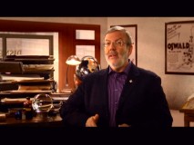 Leonard Maltin introduces each disc in a room that's been decorated with Oswald imagery.