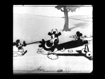 Minnie tries to prevent Carolyn Cow (a forebear to Clarabelle) from wrecking Lucky Mickey's flight in "Plane Crazy."