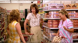 Joan gets some grocery store solace from her two best friends, Sally (Cheryl Hines) and Sheila (Allison Mackie).