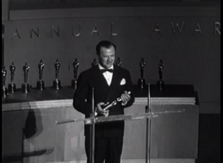 The Fox Movietone newsreel on the 1950 Oscars ceremony abruptly ends after announcing Joseph L. Mankiewiecz's double wins for writing and directing "Three Wives."