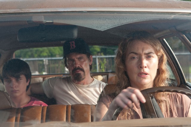 Escaped convict Frank Chambers (Josh Brolin) gets a ride from single mother Adele Wheeler (Kate Winslet) and her 13-year-old son Henry (Gattlin Griffith) in "Labor Day."