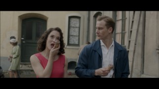 Marlene (Friederike Becht) and Johann (Alexander Fehling) enjoy a walk and talk with chocolate ice cream cones in this deleted scene.