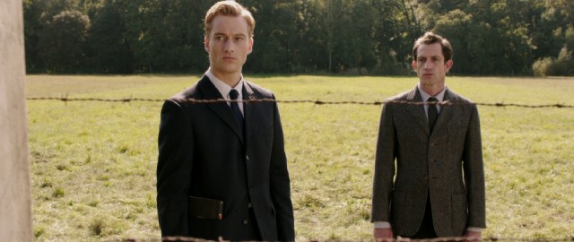 Johann (Alexander Fehling) and Thomas (Andr Szymanski) visit Auschwitz to recite the Kaddish for the departed daughters of their friend in "Labyrinth of Lies."