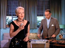 Peggy Lee demonstrates how to sing "The Siamese Cat Song" with yourself while Sonny Burke plays the xylophone in "Cavalcade of Songs."
