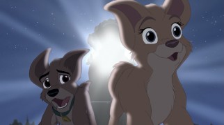 Scamp and Angel run out of the way of a fast-approaching train.