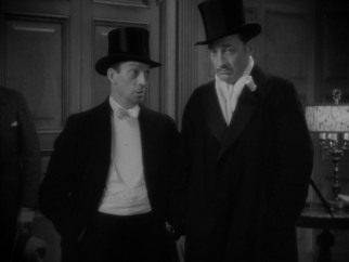 Dave the Dude (Warren William, right) abides, just not by the law, as Happy McGuire (Ned Sparks) can attest.