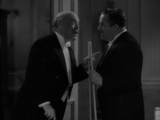 "Judge" Blake/Mr. E. Worthington Manville (Guy Kibbee) can't resist a little billiards hustling of visiting dignitary Count Alfonso Romero (Walter Connolly).