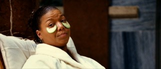 In "Last Holiday", Georgia Byrd (Queen Latifah) lives up what are supposed to be her final weeks alive, dispatching advice with half-eaten cucumbers under her eyes.