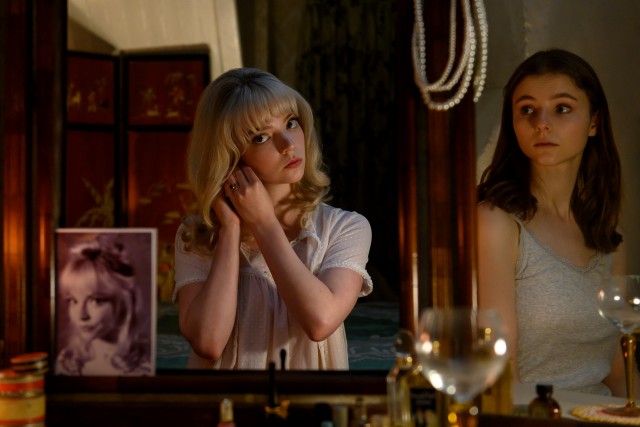 Present-day fashion student Eloise (Thomasin Mckenzie) gets a glimpse into the 1960s lifestyle of aspiring singer Sandie (Anya Taylor-Joy) in Edgar Wright's "Last Night in Soho."
