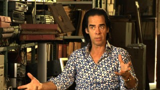 Screenwriter and composer Nick Cave gives his perspective in his loudly-dressed appearance in "The True Story of the Wettest County in the World."