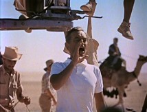 While making movie history, David Lean shouts direction in "Wind, Sand and Star."