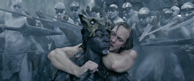 Though surrounded by spears, Tarzan (Alexander Skarsgrd) puts Chief Mbonga (Djimon Hounsou) in a compromising position.