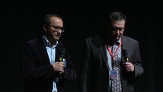 Director Andrey Zvyagintsev addresses the Toronto International Film Festival in Russian, his remarks translated by the interpreter to his left.