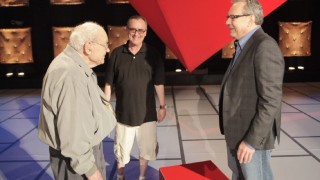 Sam Black, John Bowman, and Lewis Black share the stage Sam designed in a pre-show photo gallery image.