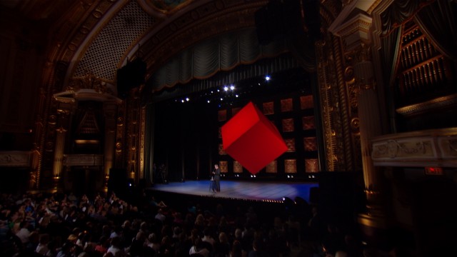 This long shot gives us a good look at the suspended red cube which adorns the stage at the State Theatre in Minneapolis for Lewis Black's 2011 show.