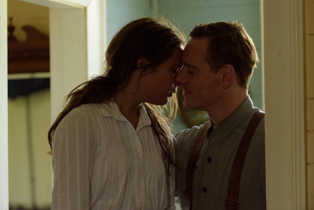 Real-life couple Michael Fassbender and Alicia Vikander play Tom and Isabel Sherbourne, who find happiness as lighthouse keepers on a remote island in "The Light Between Oceans."
