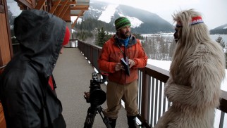 Documentarians chat with a Yeti in one of the film's very few non-skiing moments.