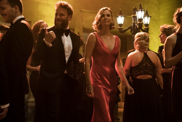 Fred Flarsky (Seth Rogen) dresses to impress Charlotte Field (Charlize Theron) in the romantic comedy "Long Shot."
