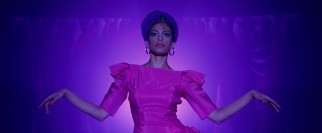 Ryan Gosling's partner Eva Mendes plays Miss Kitty Cat, a gore stage show performer.