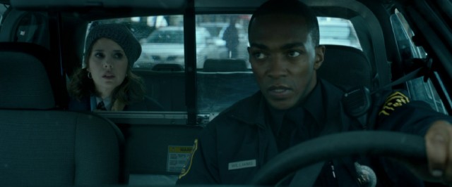 The world's slowest arrest becomes a therapy session, as Emma (Marisa Tomei) plays backseat doctor to the robotic Officer Williams (Anthony Mackie).