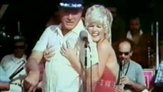 Some historical perspective for celebrity USO tours is supplied with this clip of Bob Hope and Connie Stevens entertaining the troops.