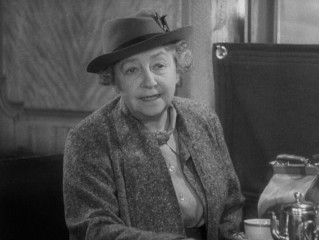 Dame May Whitty plays Miss Froy, the titular vanishing lady whose existence is called into question.