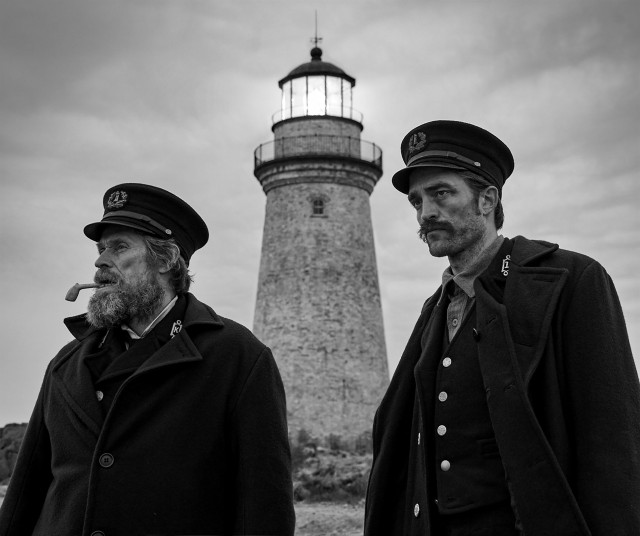 Willem Dafoe and Robert Pattinson play lighthouse keepers in Robert Eggers' "The Lighthouse", one of the best films of 2019.