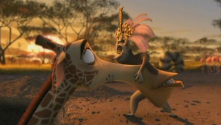 Julien (Sacha Baron Cohen) demonstrates to Melman (David Schwimmer) how he should express his love to Gloria.