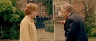 First Secretary of State Barbara Castle (Miranda Richardson) and Prime Minister Harold Wilson (John Sessions) have an outdoor chat about the Dagenham labor situation, not seeing it eye to eye.
