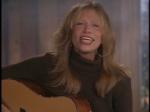 I would have preferred Kenny Loggins and Amy Grant's classic "Return to Pooh Corner", but Carly Simon does a pretty good job with the theme to "Winnie to Pooh."