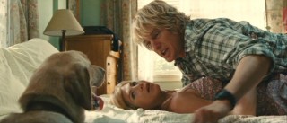 It's difficult for John (Owen Wilson) and Jennifer (Jennifer Aniston) to expand their family with their current one watching.
