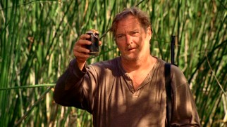 In honor of his freshly-eaten friend, Zeke (Bobby Ray Shafer) cracks open a can of beer we can only hope Vance Refrigeration kept cool.