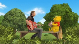 Pooh shows more attentiveness than usual when listening to Kenny Loggins sing "Underneath the Same Sky."