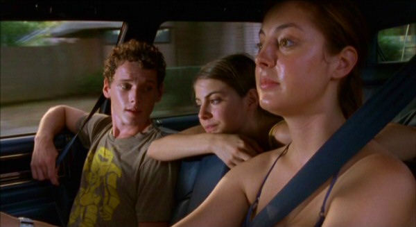 Two out of three teenagers (Anton Yelchin, Willa Holland, Eva Amurri) are visibly sweaty whilst taking this summer drive in the middle of nowhere (Louisiana).
