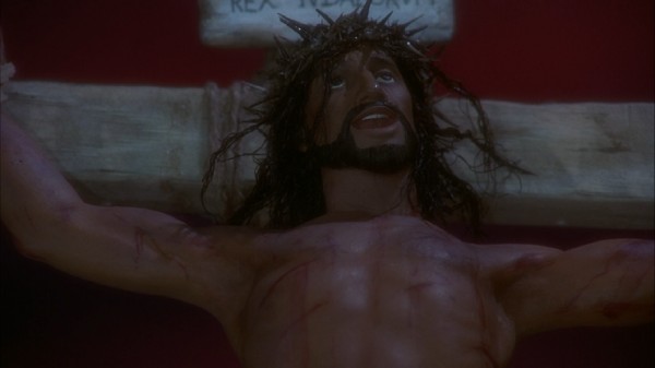 Nailed to the cross in a Crown of Thorns, Jesus Christ utters some final words to his Father.