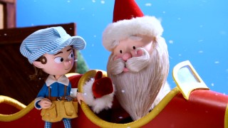 Santa Claus gives a thumb up to his newly-introduced chief mechanic Tinsel.