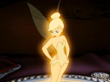 Tinker Bell sizes herself up atop a handheld mirror.
