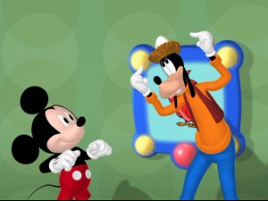 Goofy has a swell new hat with a pom-pon on top. It's definitely not a bird's nest with an egg in it.