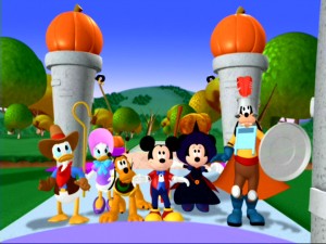 The valiant group (left to right, cowboy Donald, Little Bo Peep Daisy, bee Pluto, magician Mickey, witch Minnie, knight Goofy) arrives at Trick-or-Treat tower for Pete's Halloween party.