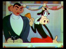 They should be watching the game, but Clarabelle Cow instead makes a move on Clark Gable in "Mickey's Polo Team."