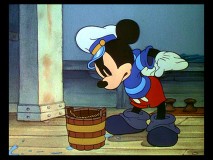 Sailor Mickey gets confused by a bucket in "The Whalers."
