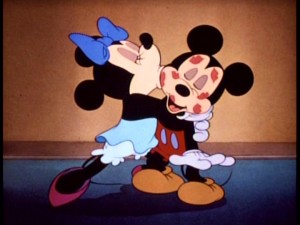 "Pucker up!" Minnie plants one on Mickey in the Easter Egg short, "Mickey's Surprise Party."