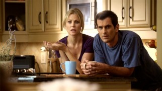 Claire (Julie Bowen) and Phil (Ty Burrell) observe two of their three kids getting along... briefly.