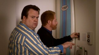 Cam (Eric Stonestreet) and Mitchell (Jesse Tyler Ferguson) find themselves trapped in the garage of Mitchell's potential new employer in "Benched."
