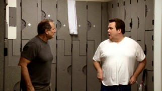 Well this is awkward... Jay (Ed O'Neill) and Cam (Eric Stonestreet) come up from what's known as a moon landing in the locker room before their racquetball game.