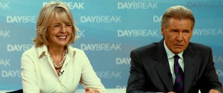 The expressions of Colleen Peck (Diane Keaton) and Mike Pomeroy (Harrison Ford) are indicative of the anchors' clashing personalities.