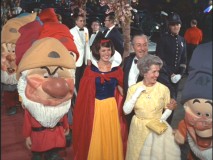 Walt Disney is joined by Snow White and the Seven Dwarfs at the Gala World Premiere.