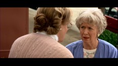Polly Holliday's role amounts to little more than a cameo in the final film, but her character, nosy neighbor Gloria Chaney, is prominently featured in the DVD's hearty deleted scenes section.