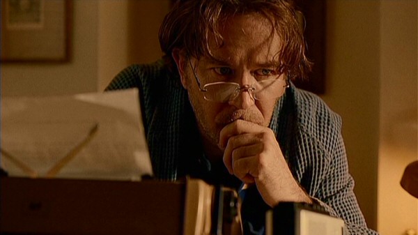 Unhappy architect Gabriel Richmond (Timothy Hutton) does his best work in the bathroom, where the typewriter and tape recorder seem to be just for show.